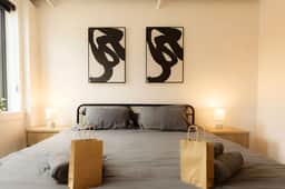 Above The Roots | Modern 1BD with Sophisticated Charm