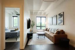 Above The Roots | Stylish 1BD on the Square
