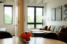 Above The Roots | Stylish 1BD on the Square